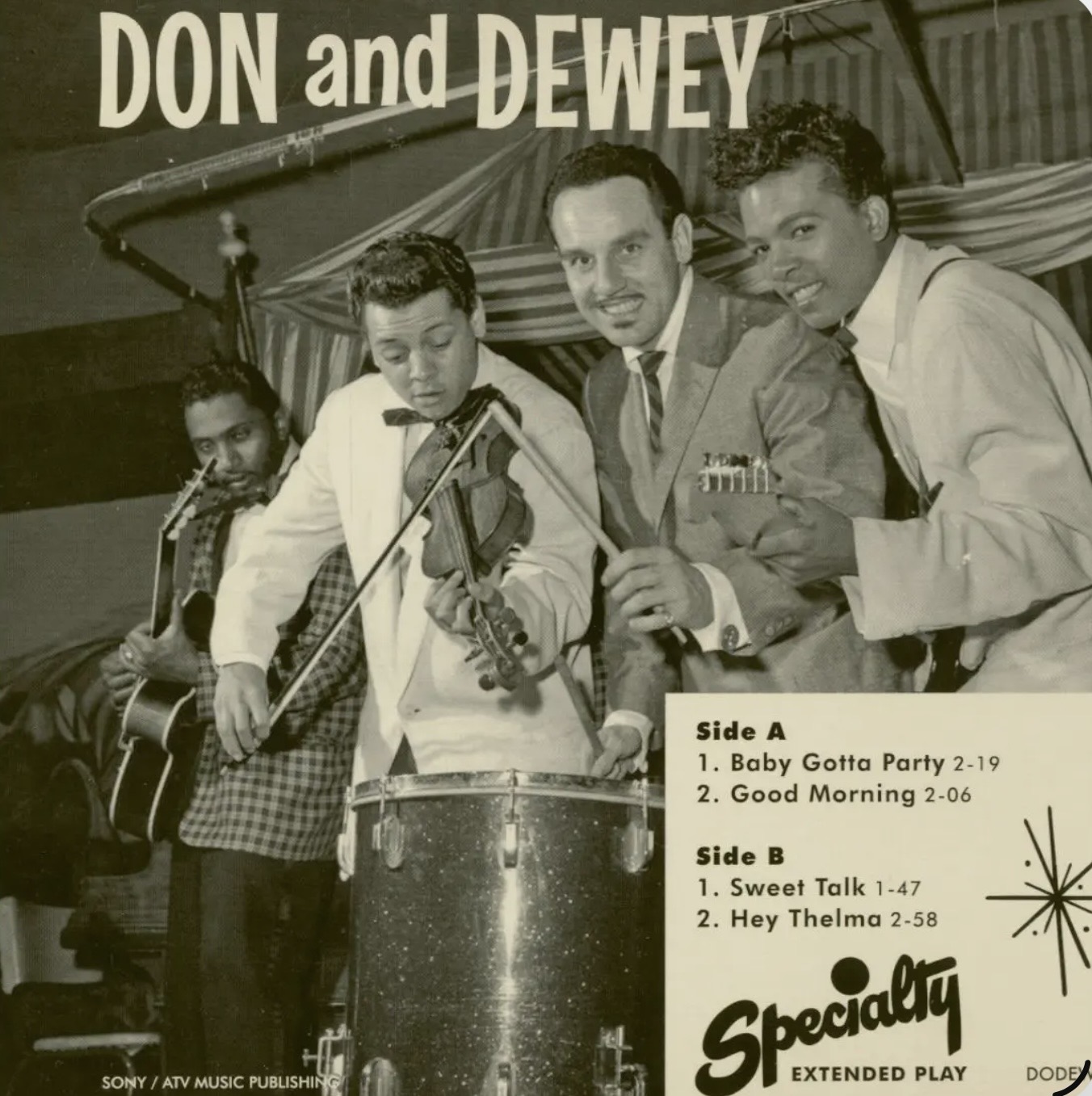 Don & Dewey surround Johnny Otis on stage for Specialty Records