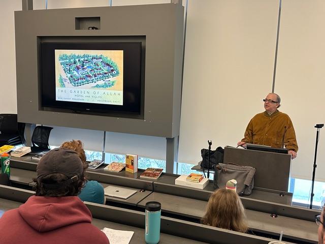 Domenic Priore teaches a class on Sunset Strip at Emerson College. Garden of Allah on screen.